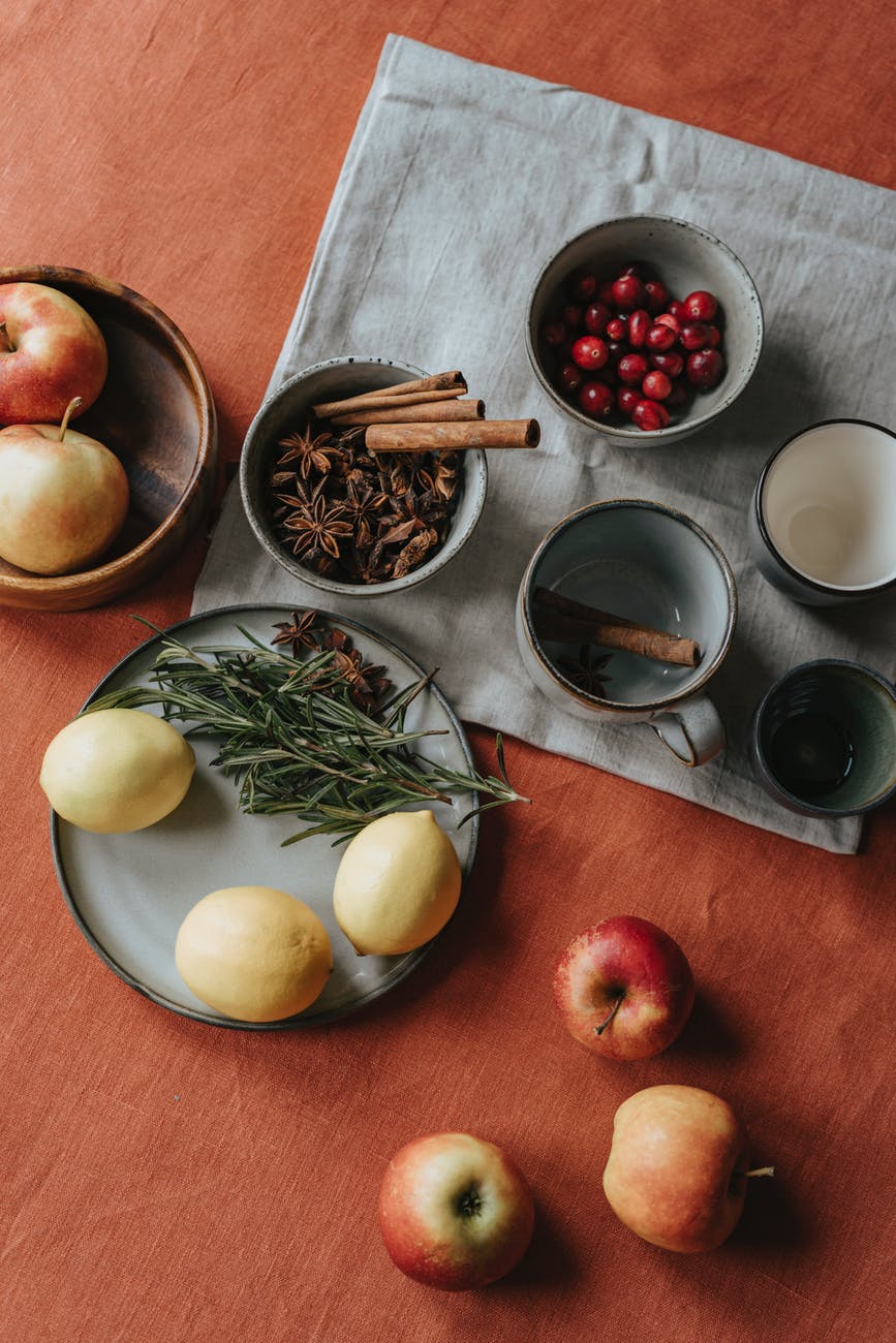 photo of fruits and spices on table